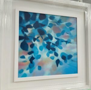 An original painting on canvas in cool shades of blue and navy, with a hint of brown, in a bespoke off white frame.