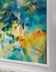 An original painting on canvas of a leafy canopy scene in vibrant summer yellows, greens and blues in a bespoke with frame.