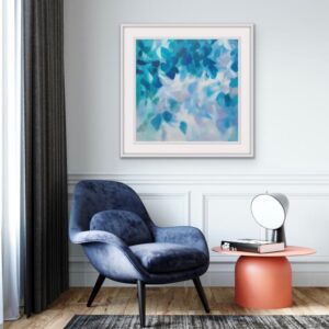 Blue leafy tree canopy monochromatic painting from the Canopy Series by Irish nature artist Eibhilin Crossan. with blue chair. side table and curtains.