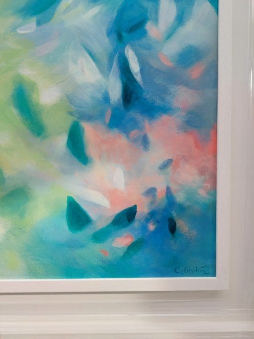 An original painting on canvas in Soft Green and Blue colours with pops of pink, of a leafy tree canopy with a Spring like feel in a bespoke with frame.
