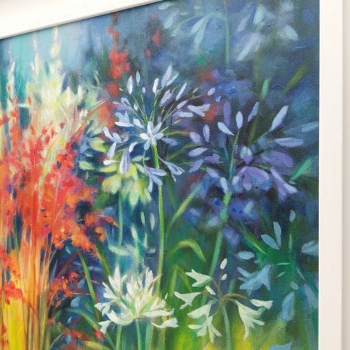 Colourful floral original painting in a white frame of agapanthus flowers growing wild by Irish nature artist Eibhilin Crossan