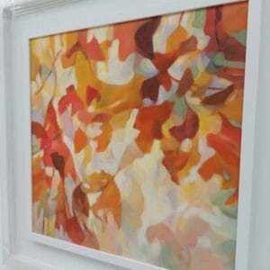 An original painting on canvas of a leafy canopy scene in mellow autumnal orange, gold and brown shades, in a bespoke off white frame.